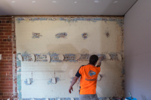 Application of Adhesive for New Wall